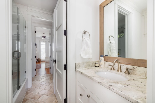 bathroom with vanity and ceiling fan