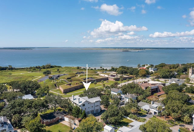 drone / aerial view with a water view