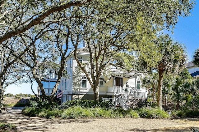 view of front of property with stairway