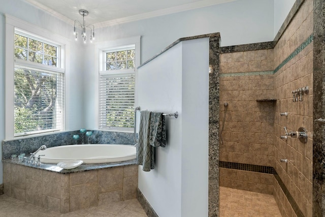 full bath featuring a garden tub, a healthy amount of sunlight, and a tile shower