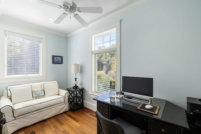 office featuring ceiling fan, wood finished floors, baseboards, and ornamental molding