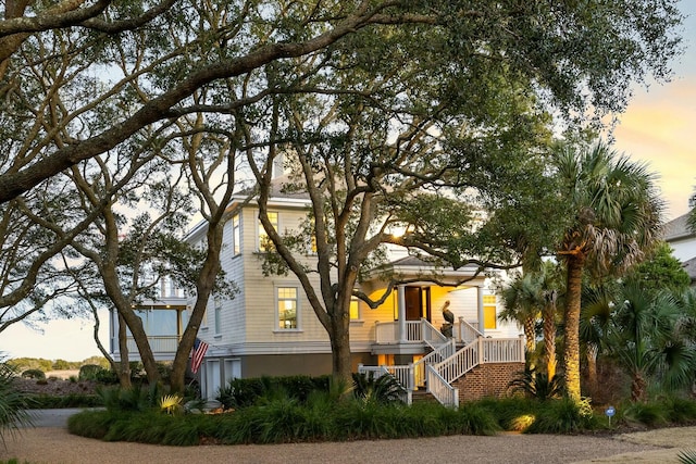 view of front of house with stairway