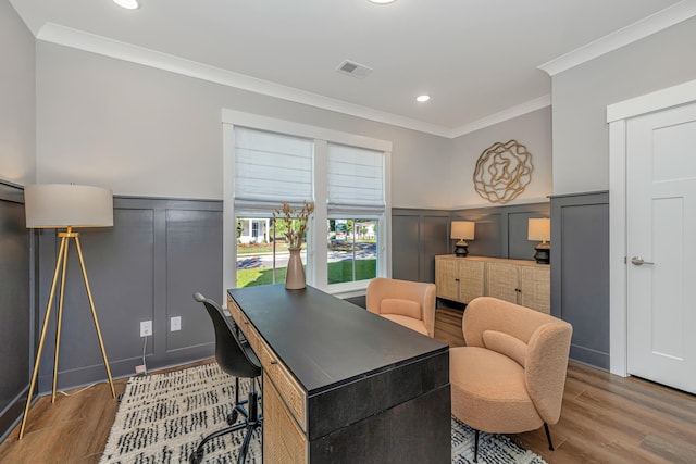 office area featuring crown molding and hardwood / wood-style floors