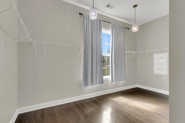 unfurnished dining area with dark hardwood / wood-style floors