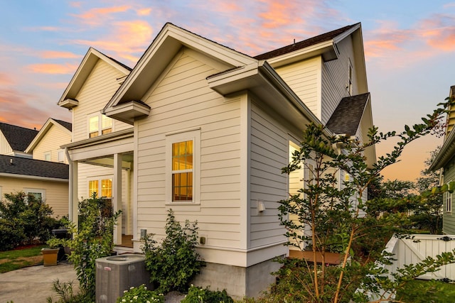 property exterior at dusk with central AC