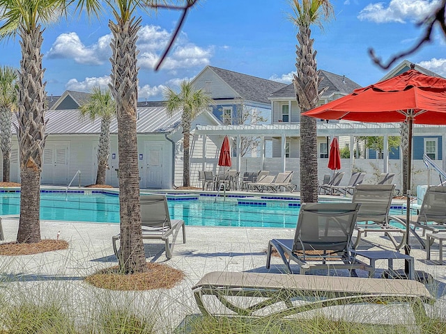 view of pool featuring a pergola and a patio area