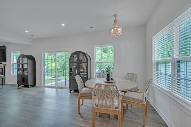 445 Oswego Ct, Greenville, SC 29607 - dining room featuring wood finished floors, recessed lighting, a chandelier, and baseboards