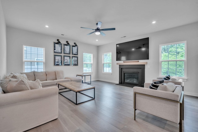 445 Oswego Ct, Greenville, SC 29607 - living area featuring a ceiling fan, wood finished floors, baseboards, a fireplace with flush hearth, and recessed lighting