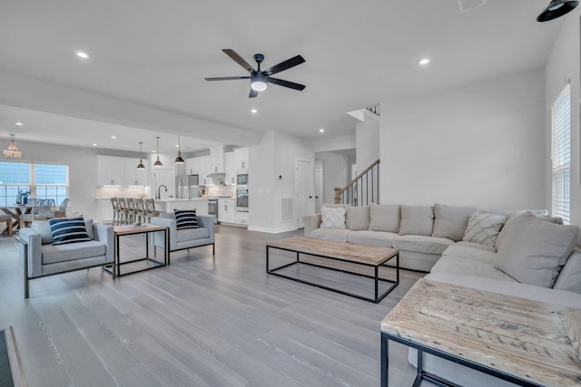 445 Oswego Ct, Greenville, SC 29607 - living room featuring ceiling fan, healthy amount of natural light, light wood finished floors, recessed lighting, and baseboards
