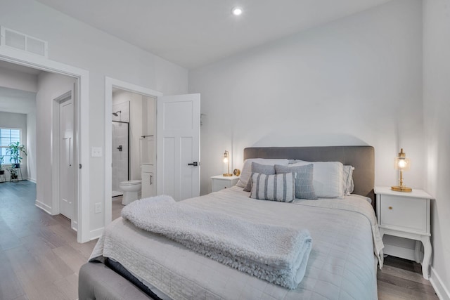 445 Oswego Ct, Greenville, SC 29607 - bedroom with wood finished floors, baseboards, recessed lighting, and ensuite bath
