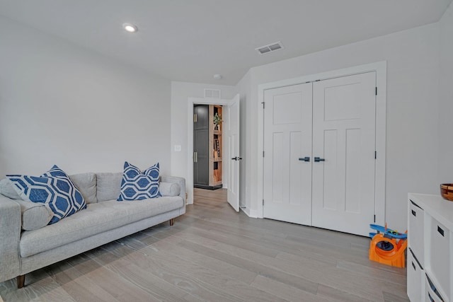 445 Oswego Ct, Greenville, SC 29607 - living room with light wood-type flooring, baseboards, and recessed lighting