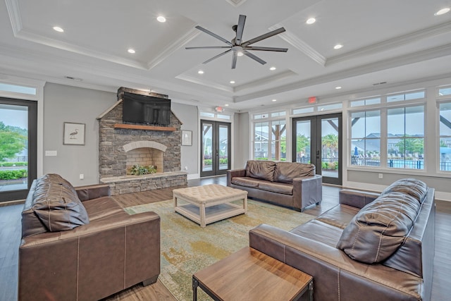 445 Oswego Ct, Greenville, SC 29607 - living room featuring french doors, light wood-type flooring, healthy amount of natural light, ornamental molding, and a ceiling fan