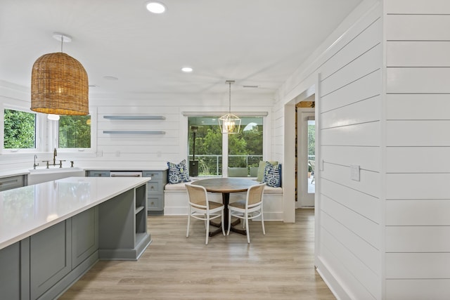 1075 Wayfarer Ln, Charleston, SC 29412 - kitchen with gray cabinetry, open shelves, recessed lighting, and light wood-style floors