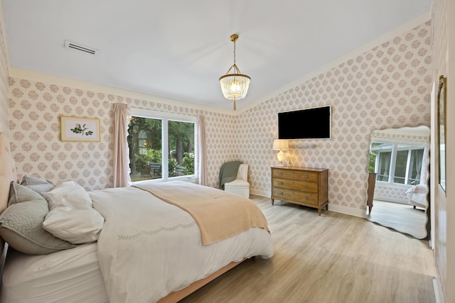 1075 Wayfarer Ln, Charleston, SC 29412 - bedroom featuring wallpapered walls, lofted ceiling, light wood-type flooring, ornamental molding, and access to exterior
