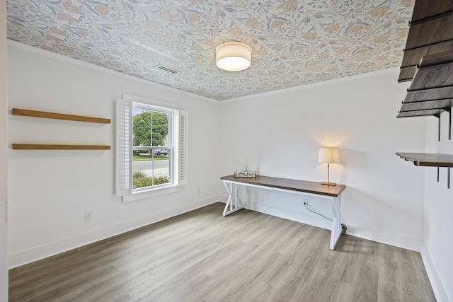 1075 Wayfarer Ln, Charleston, SC 29412 - spare room with ornamental molding, wood finished floors, and an ornate ceiling
