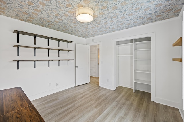 1075 Wayfarer Ln, Charleston, SC 29412 - unfurnished bedroom with a closet, wood finished floors, and an ornate ceiling