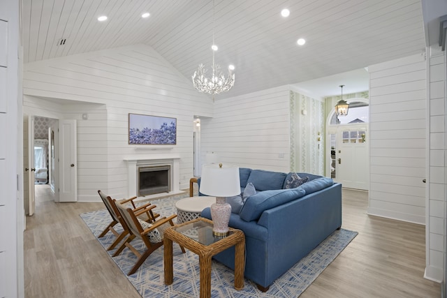 1075 Wayfarer Ln, Charleston, SC 29412 - living area featuring light wood finished floors, wooden ceiling, a chandelier, recessed lighting, and wooden walls