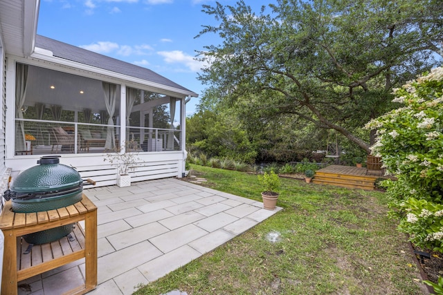 1075 Wayfarer Ln, Charleston, SC 29412 - view of grassy yard with a patio area and a sunroom