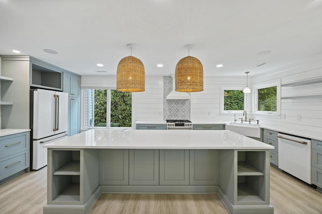 1075 Wayfarer Ln, Charleston, SC 29412 - kitchen featuring open shelves, white appliances, and light countertops