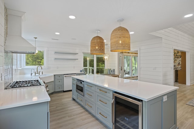 1075 Wayfarer Ln, Charleston, SC 29412 - kitchen featuring beverage cooler, gray cabinets, open shelves, stainless steel appliances, and recessed lighting