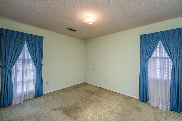 4328 Cheviot Dr, North Charleston, SC 29418 - carpeted spare room with a textured ceiling and baseboards