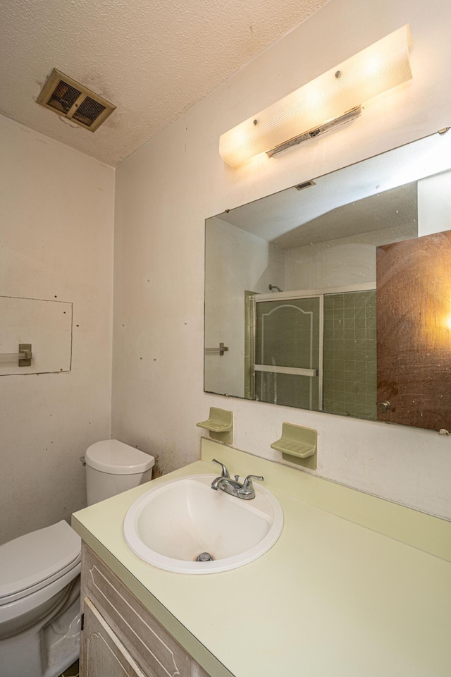 4328 Cheviot Dr, North Charleston, SC 29418 - full bath featuring vanity, toilet, a walk in shower, and a textured ceiling