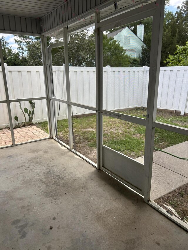 unfurnished sunroom featuring a healthy amount of sunlight