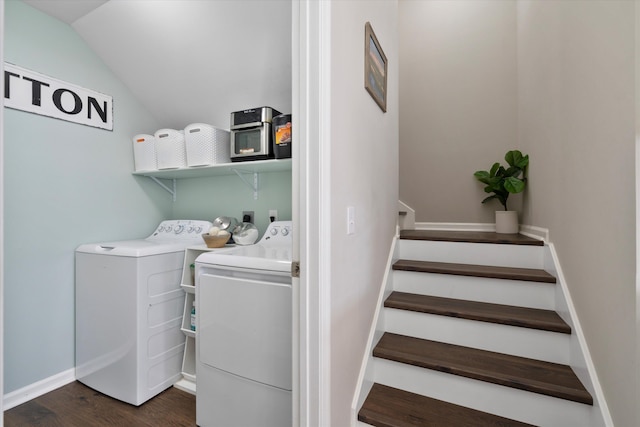 laundry area with dark wood finished floors, laundry area, independent washer and dryer, and baseboards