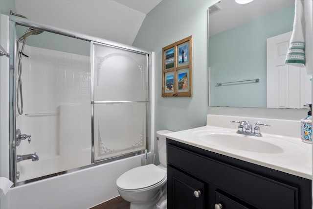 bathroom featuring shower / bath combination with glass door, toilet, and vanity