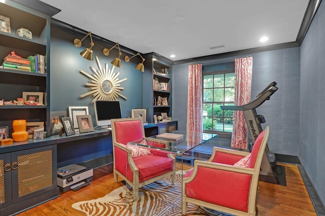 home office featuring crown molding, recessed lighting, wood finished floors, and visible vents
