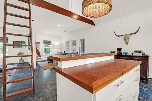 interior space with recessed lighting and finished concrete flooring