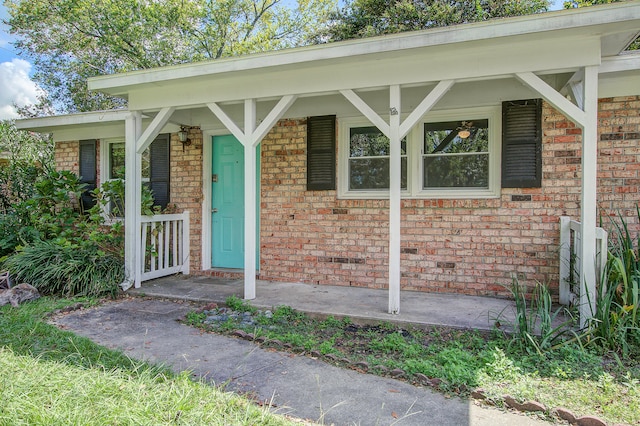 entrance to property with a porch