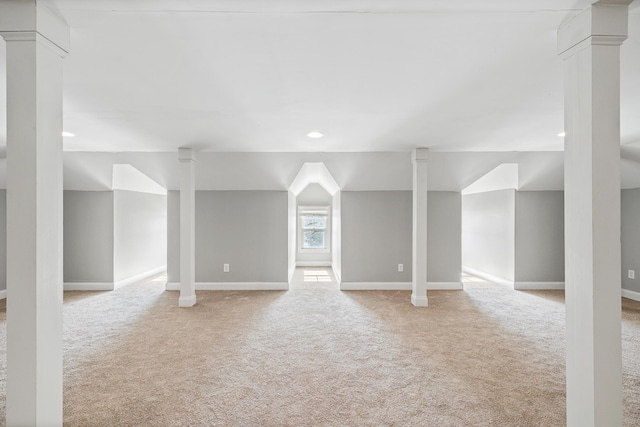 basement with light colored carpet