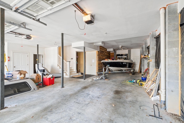 garage featuring a garage door opener