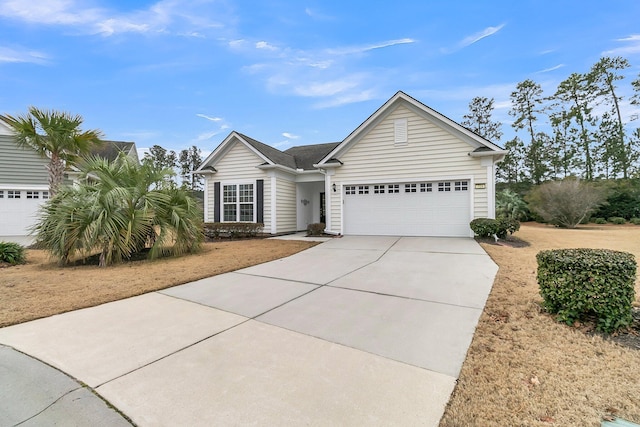 ranch-style house featuring a garage