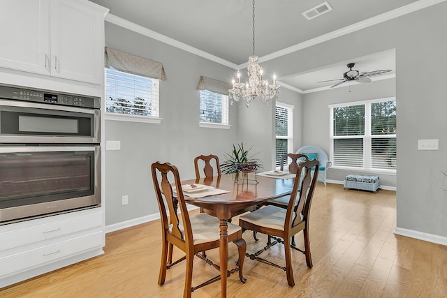 dining area featuring ceiling fan, light hardwood / wood-style floors, and crown molding