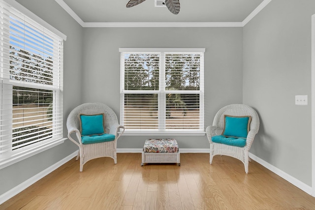 unfurnished room featuring hardwood / wood-style flooring, ceiling fan, and ornamental molding