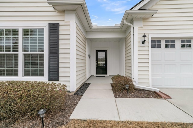 property entrance with a garage