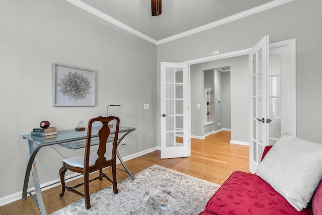 office space with french doors, wood-type flooring, and ornamental molding