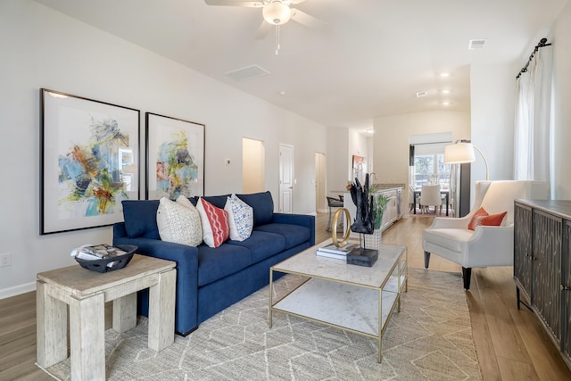 TBD Oleary Cir, Summerville, SC 29483 - living room with baseboards, visible vents, light wood-style floors, and a ceiling fan