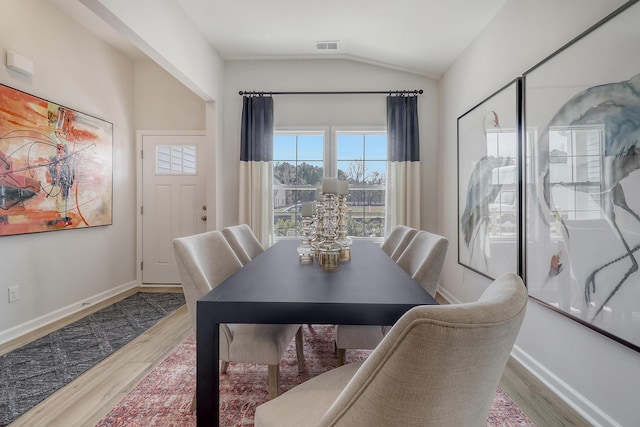 TBD Oleary Cir, Summerville, SC 29483 - dining room with baseboards, vaulted ceiling, and wood finished floors