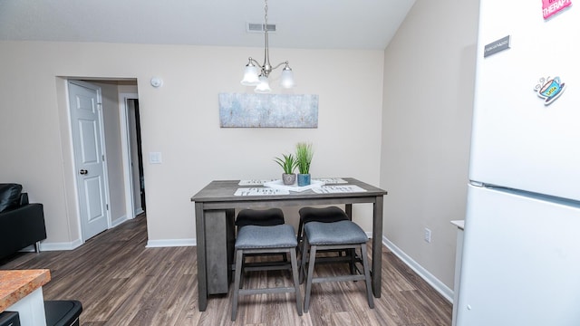 2186 Spoleto Ln, North Charleston, SC 29406 - dining area featuring wood finished floors and a chandelier