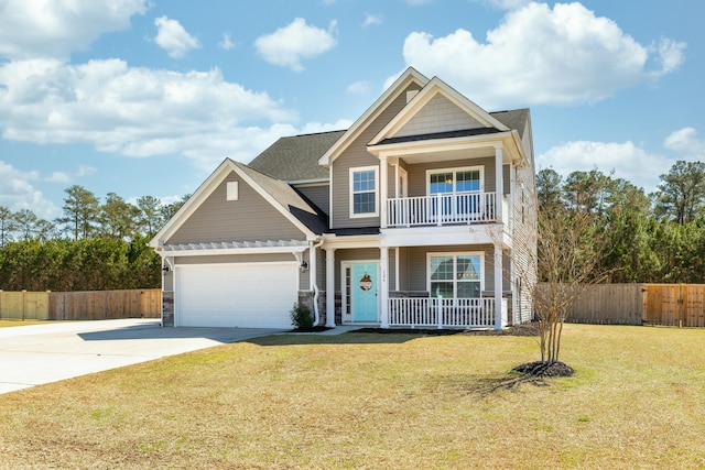 view of front of home with fence, a porch, a front yard, a balcony, and driveway