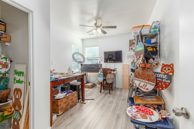 office with ceiling fan and wood finished floors