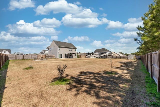 view of yard featuring a fenced backyard