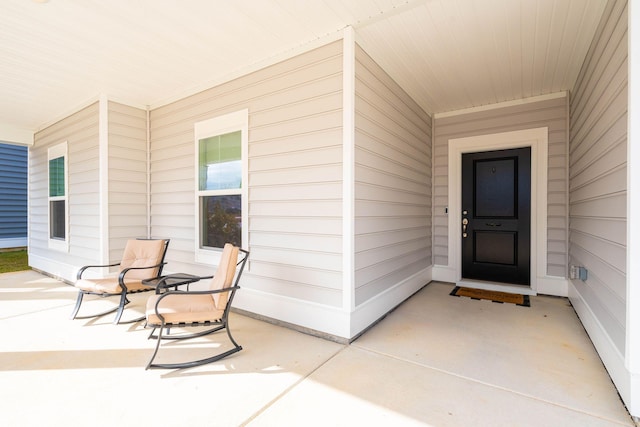 entrance to property with a porch