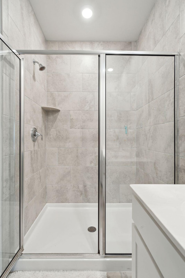 bathroom with an enclosed shower