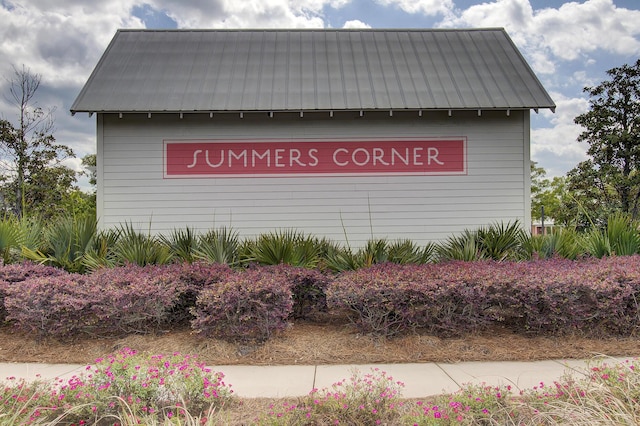 view of community sign