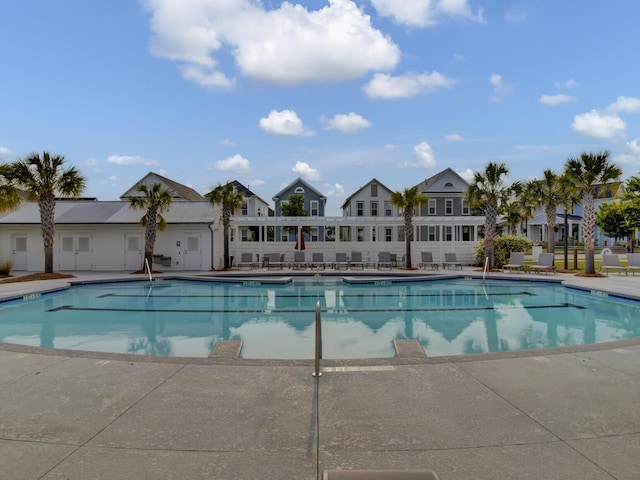 view of swimming pool with a patio area