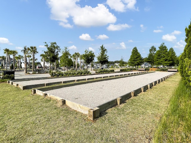 view of home's community featuring a yard